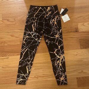 Brand new Beyond Yoga leggings, black, and ROSE gold.